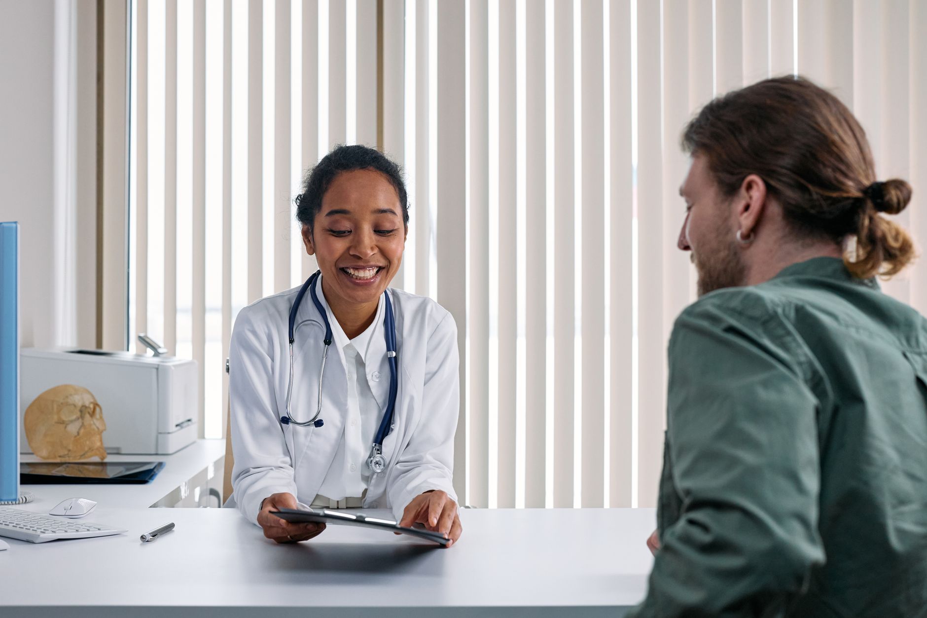 Doctor discussing blood test results with a patient