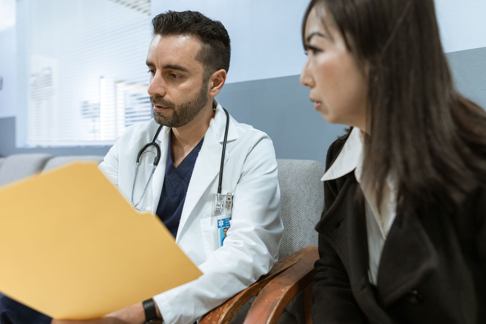 Doctor reviewing test results with a patient during a consultation