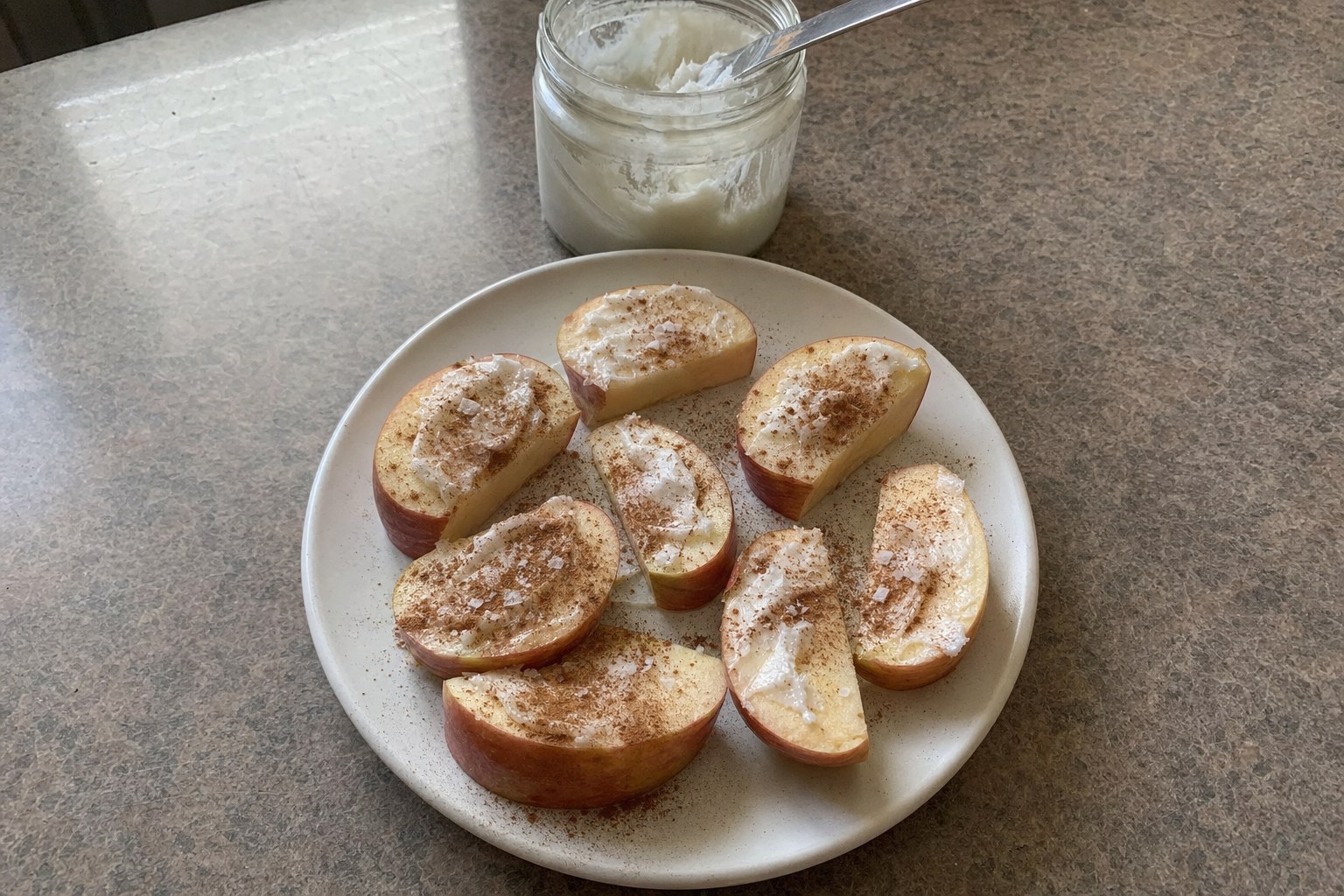 Homemade apple Slices with Coconut Butter and Cinnamon