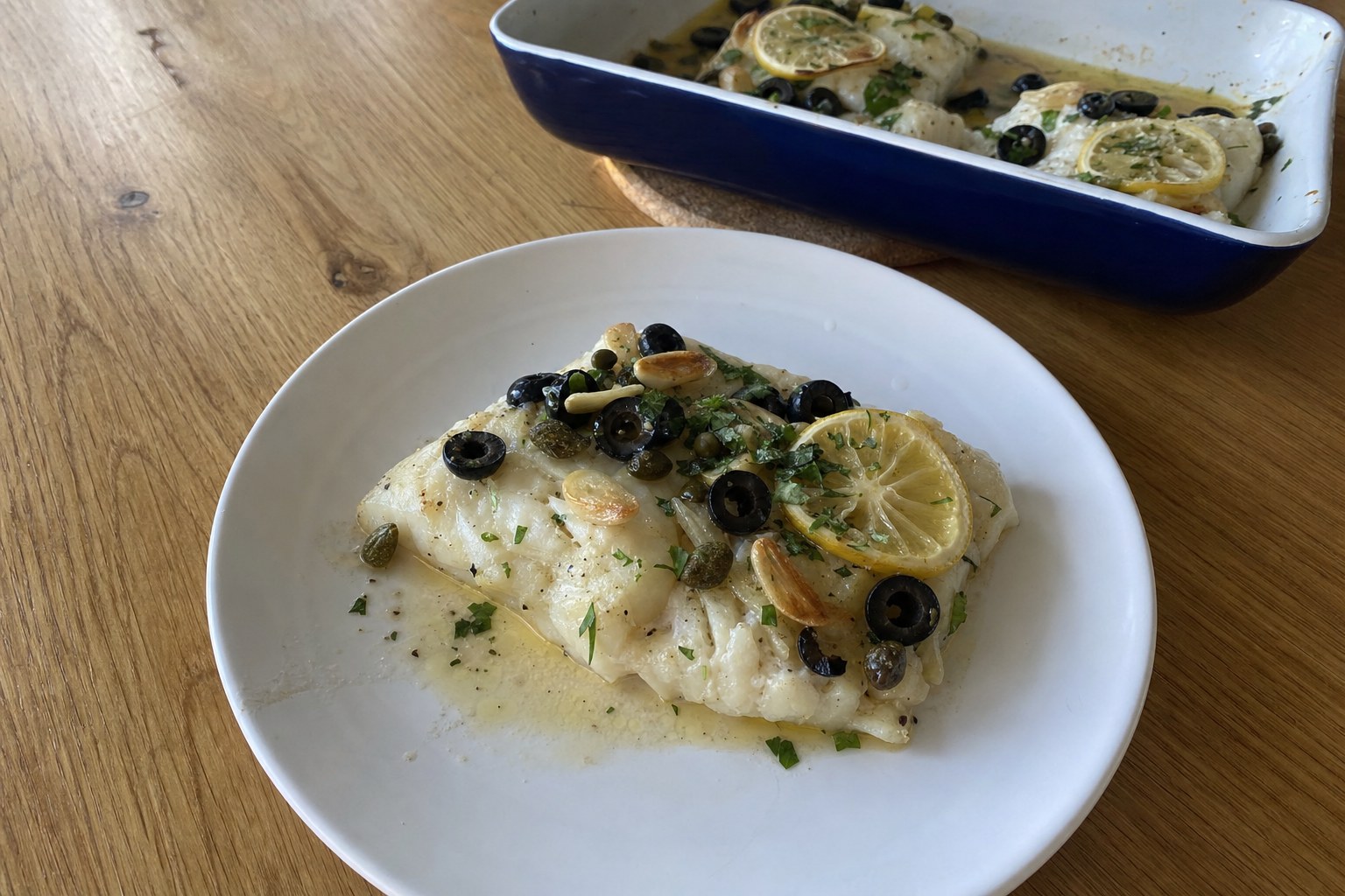 Homemade baked Cod with Olives, Lemon and Parsley