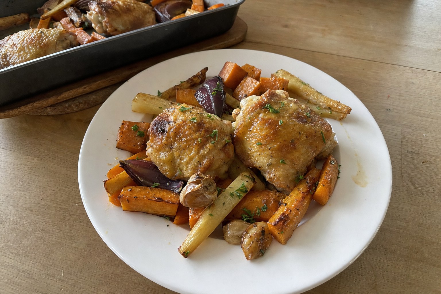 Homemade garlic and herb roast chicken thighs with root vegetables